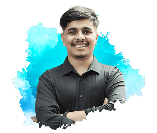 A man in a blue shirt with a happy expression